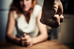 Man approaching woman with a fist - Bay Area Domestic Violence Defense